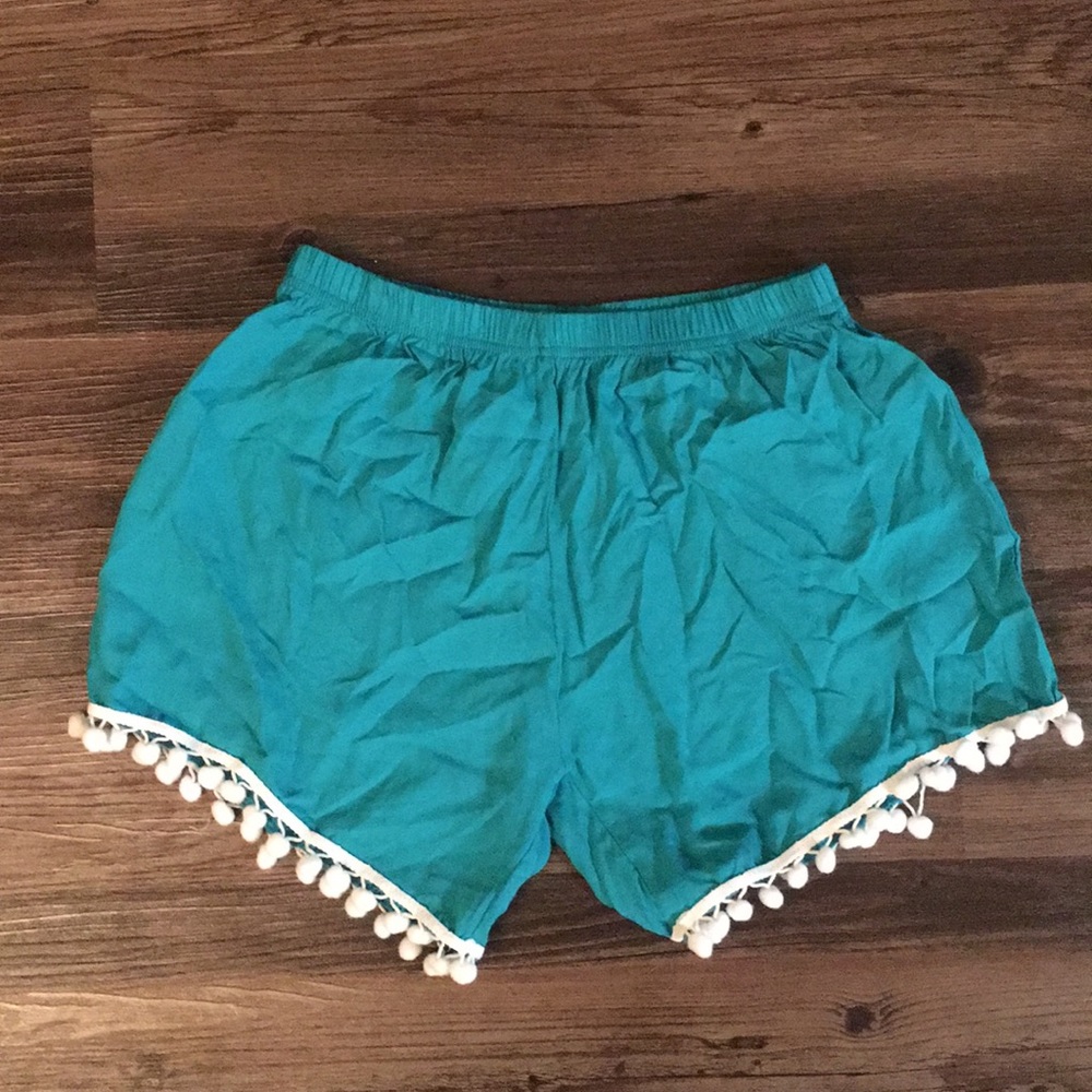 Turquoise pom-pom shorts